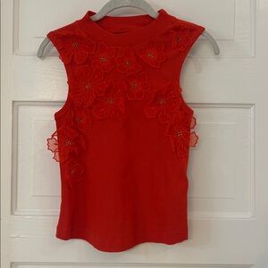 Anthropologie Orange/res Top with Floral Details. Form fitting